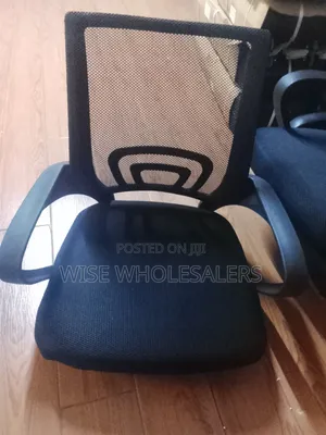 Black Mesh Office Chair With Padded Seat and Armrests