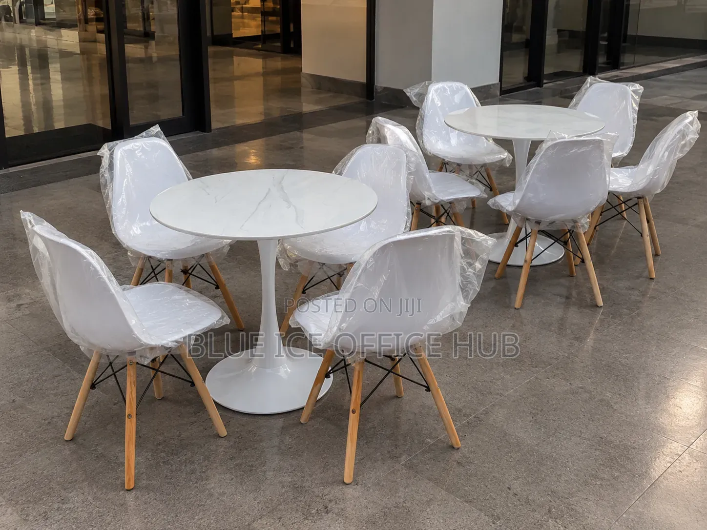 White Round Dining Table Set With 4 Eames Chairs
