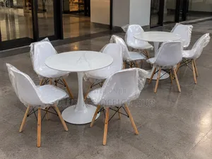 White Round Dining Table Set With 4 Eames Chairs