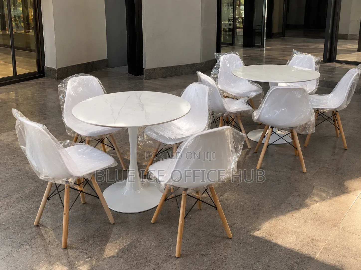 White Round Dining Table Set With 4 Eames Chairs