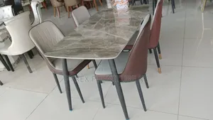 4 Chair Rectangular Faux Marble Top With Black and Leather Chairs