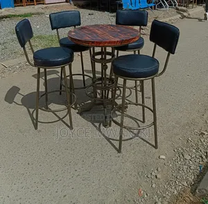 High Bar Chairs Set, Round Padded Seat With a Wooden Table.