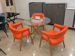 Modern Round Glass Dining Table Set With 3 Orange Chairs