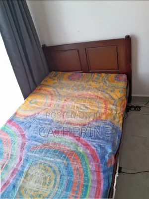 3.5 by 6 Wooden Bed With 2 Mattresses for Sale