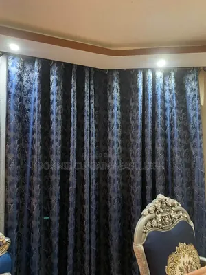 Blue and White Curtains With Rings