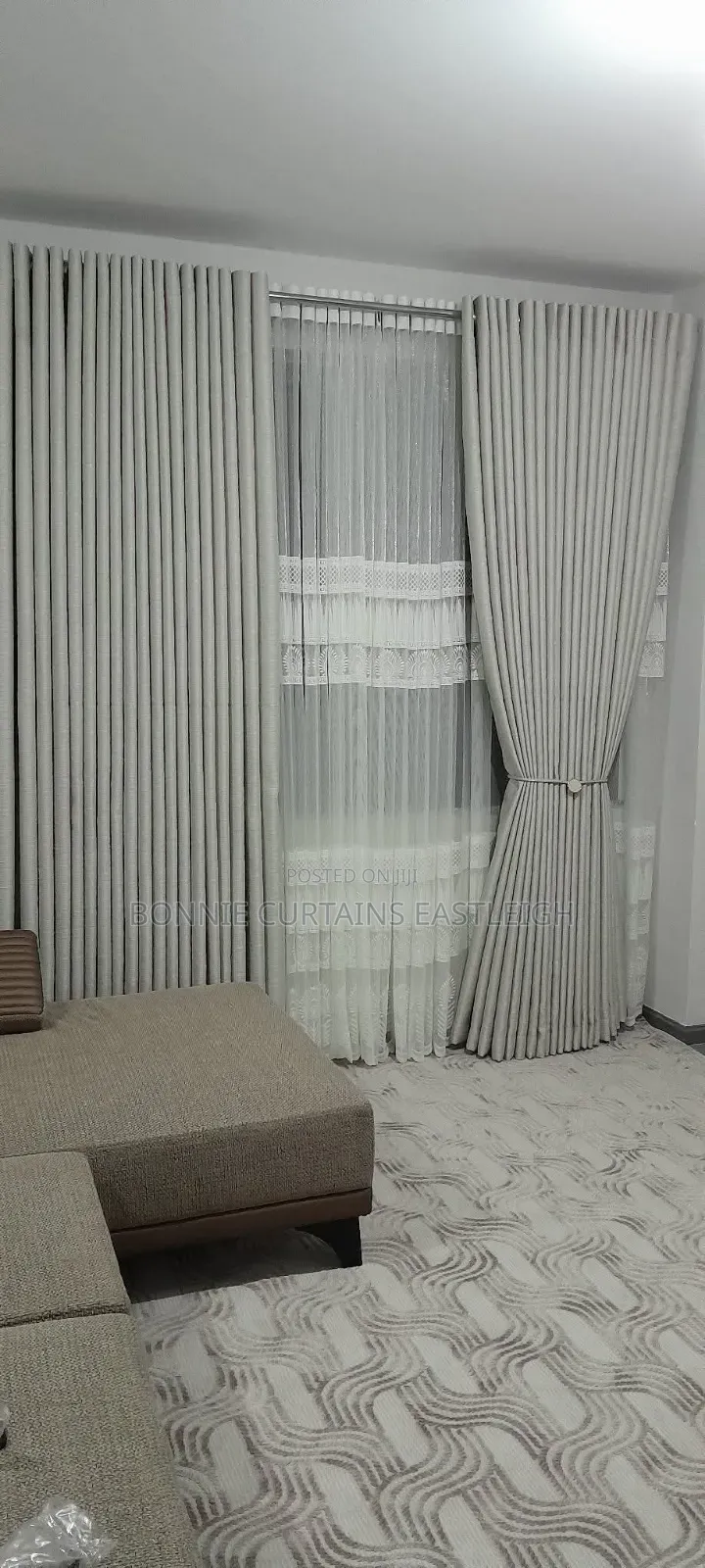 Brown and White Curtains With Rings