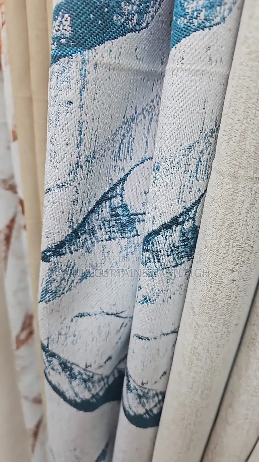 Brown and White Curtains With Rings