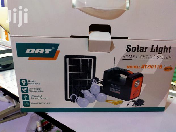 Dat at-9011 Solar Lighting Kit: FM Radio, 4 Led Bulbs, Torch